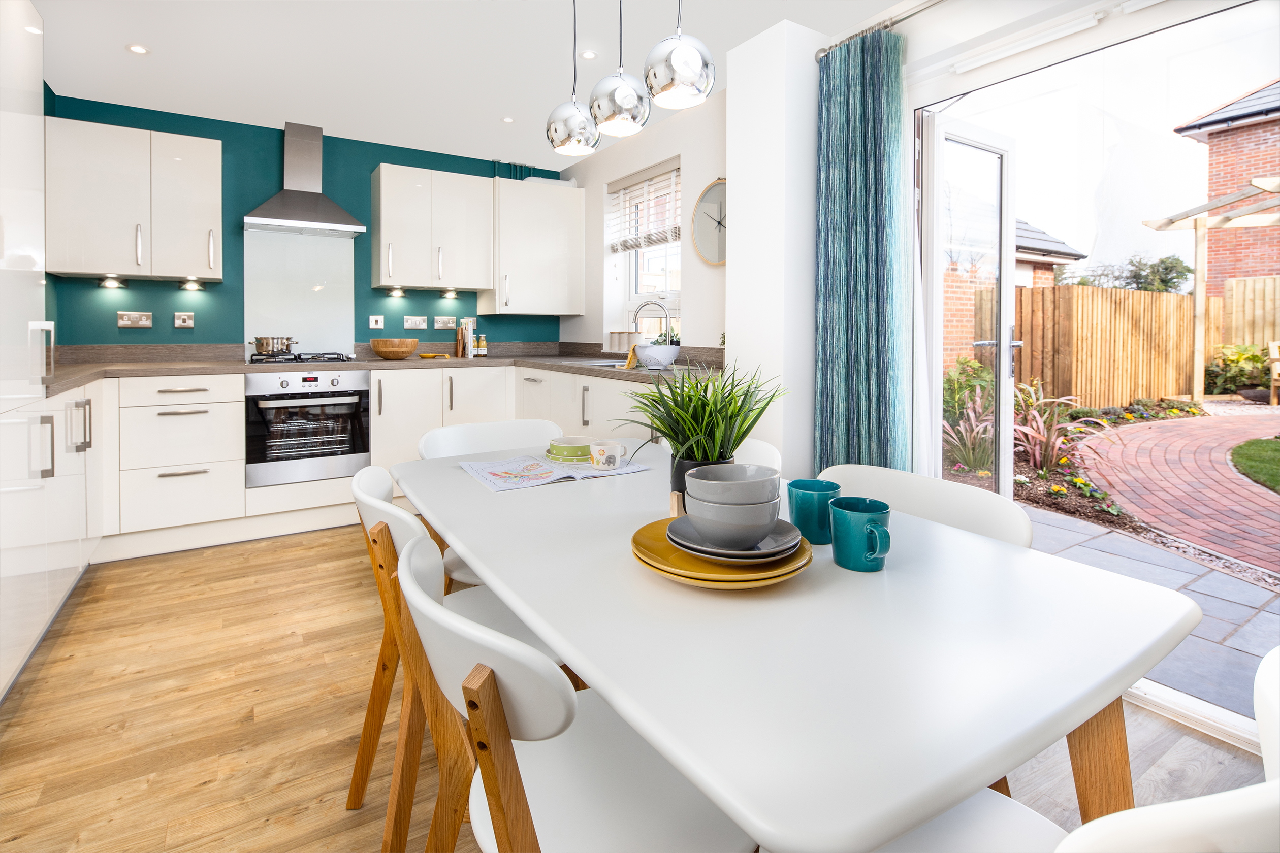Open plan kitchen with French doors to the garden in the Maidstone 3 bedroom home